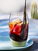 Sangria with vanilla pods in a glass