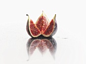 A fig, cut into three pieces