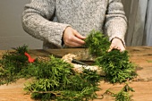 Making an Advent wreath from small conifer branches