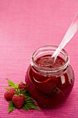 Raspberry jelly in a jar