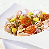 Summery ham and avocado salad with cocktail tomatoes