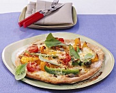 Pepper pizza with mozzarella and pumpkin seeds