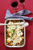 Oven-baked lamb with couscous and feta cheese