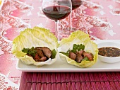 Vietnamese beefsteak on iceberg lettuce