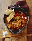 Osso buco with tomato and thyme sauce and new potatoes