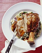 Veal shank with pearl barley and spinach