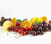 Still life with fruit (cherries, grapes, citrus fruit)