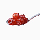 Spoonful of glacé cherries