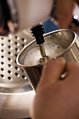 Frothing milk with an espresso machine