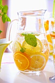 Lemonade with slices of orange and lemon