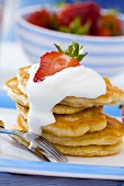 Pancakes with cream and strawberry