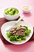 Beef & broccoli salad with pink peppercorns & sesame seeds