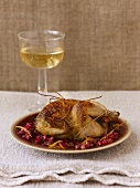 Quail with pomegranate sauce