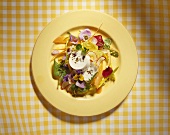 Spring salad with cheese and flowers