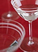 Martini glasses on red background