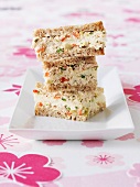 Sandwiches filled with tuna, olive and tarragon spread