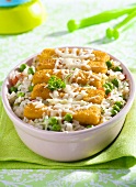 Fish fingers on vegetable rice