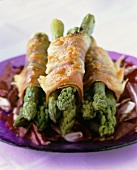 Baked green asparagus with ham and cheese