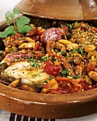 Hähnchen-Tajine mit roter Paprika und Sesam