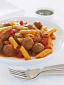 Meatballs with penne and tomato sauce