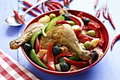 Chicken legs with peppers and olives