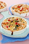 Salmon and courgette quiches