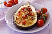 Aubergine stuffed with peppers, tomatoes and mozzarella