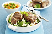 Lamb chops with peas, lentils and feta cheese