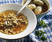 Soup with forcemeat spaetzle (noodles) & forcemeat dumplings