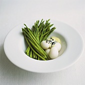 Green asparagus with quails' eggs and caviar