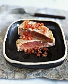 Seared tuna fillet with tomatoes and lemon dressing