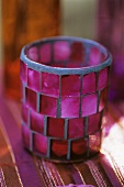 Candle in coloured glass