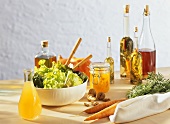 Bowl of salad, cider vinegar and other types of vinegar