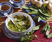 Green Asian soup with rice