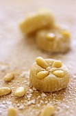 Marzipan sweets with pine nuts