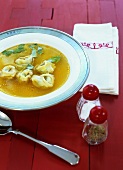 Beef and tomato broth with ricotta tortellini