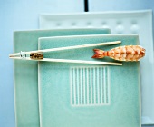 Chopsticks with nigiri sushi