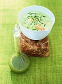 Cream of pea soup with prawns