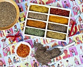 Colourful spices a seed tray with cumin and saffron threads