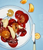 Beetroot carpaccio with oranges and red smear cheese