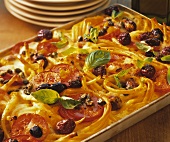 Maccaroni bake with tomatoes, olives, capers and basil