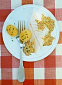 Cod with a mustard sauce and boiled potatoes