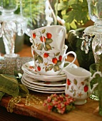 Teatime crockery with a strawberry pattern