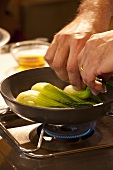 Bok choy being fried