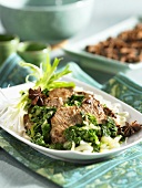 Spicy pork with star anise and bok choy