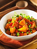 Butternut squash with pepper and peas
