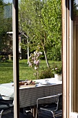 A view of a table laid in a spring garden