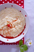 Vanilla rice pudding with strawberry sauce