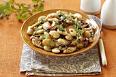 White beans with chicken, dried tomatoes and herbs
