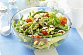 Bean salad with tomatoes and hazelnuts
